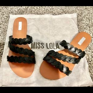 Black strapped sandal, size 7 from miss Lola